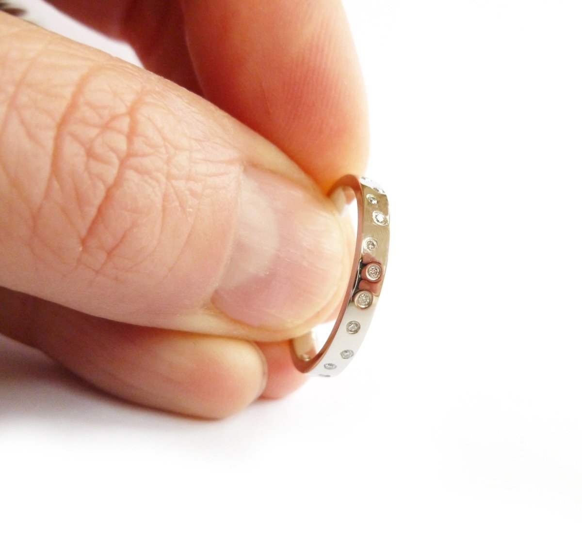 Usual, unique, bespoke and modern platinum and diamond wedding ring, eternity ring, engagement ring, Handmade by Sue Lane in Herefordshire, UK