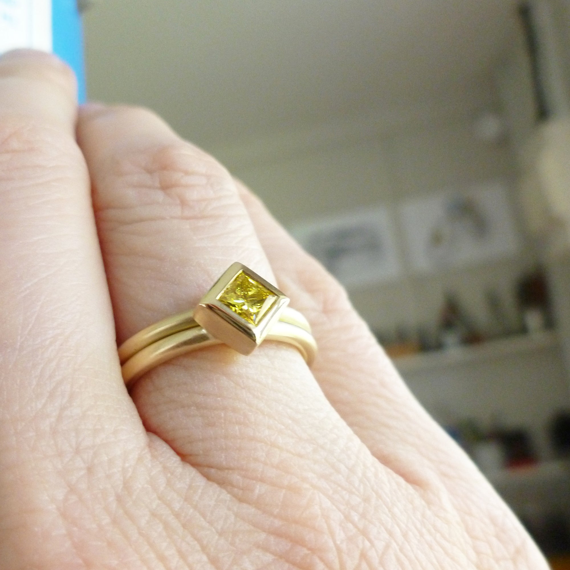 square yellow diamond staking ring