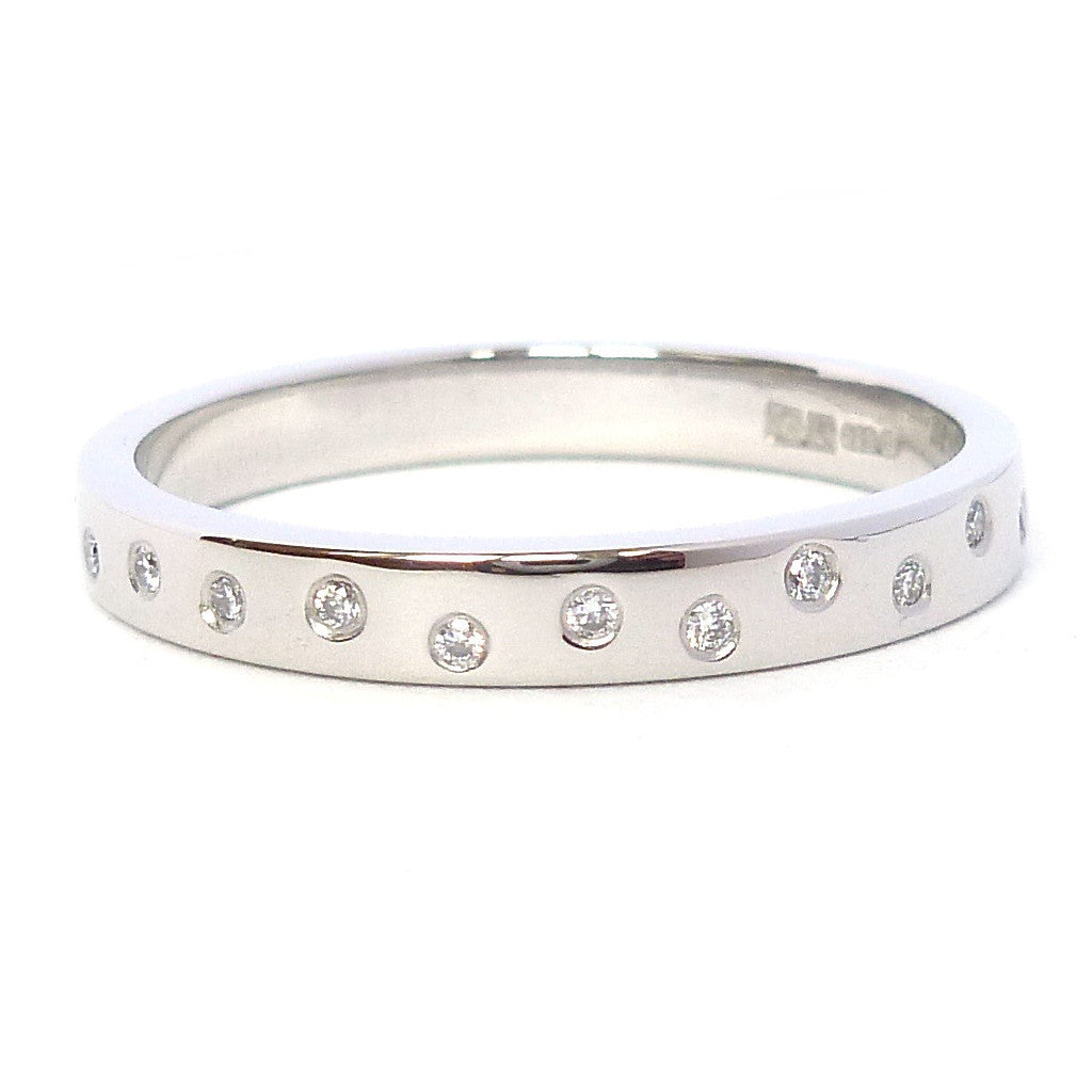 Contemporary platinum eternity ring, bespoke jewellery by Sue Lane