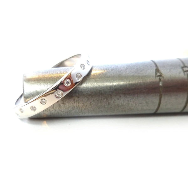 Contemporary platinum eternity ring, bespoke jewellery by Sue Lane