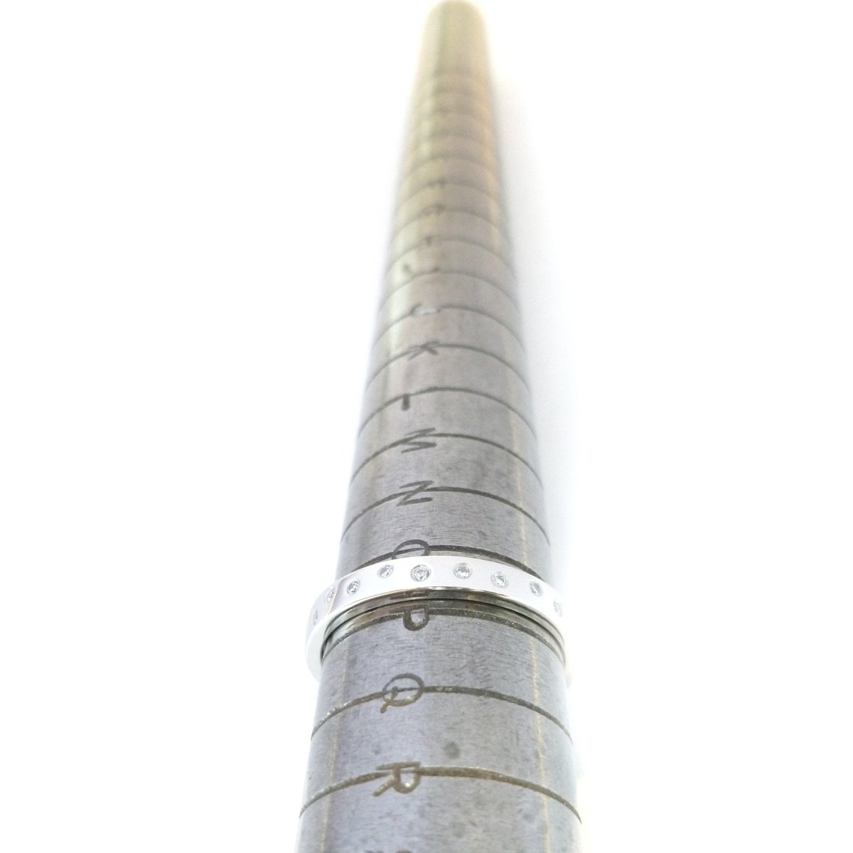 Contemporary platinum eternity ring. Bespoke jewellery by Sue Lane.