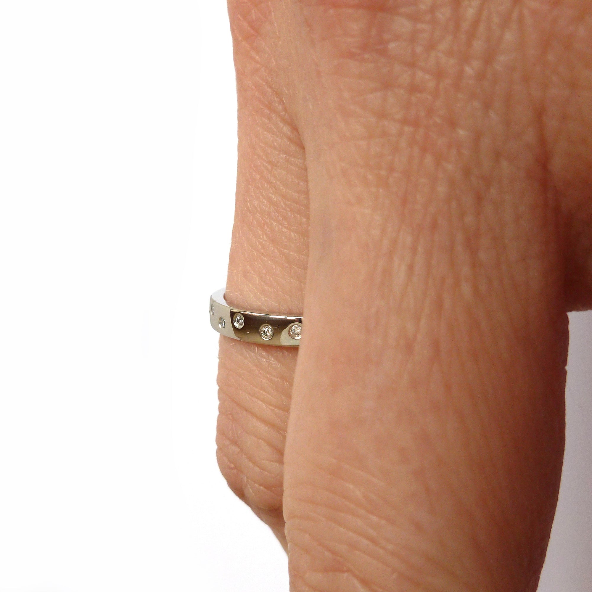 Contemporary platinum eternity ring, bespoke jewellery by Sue Lane