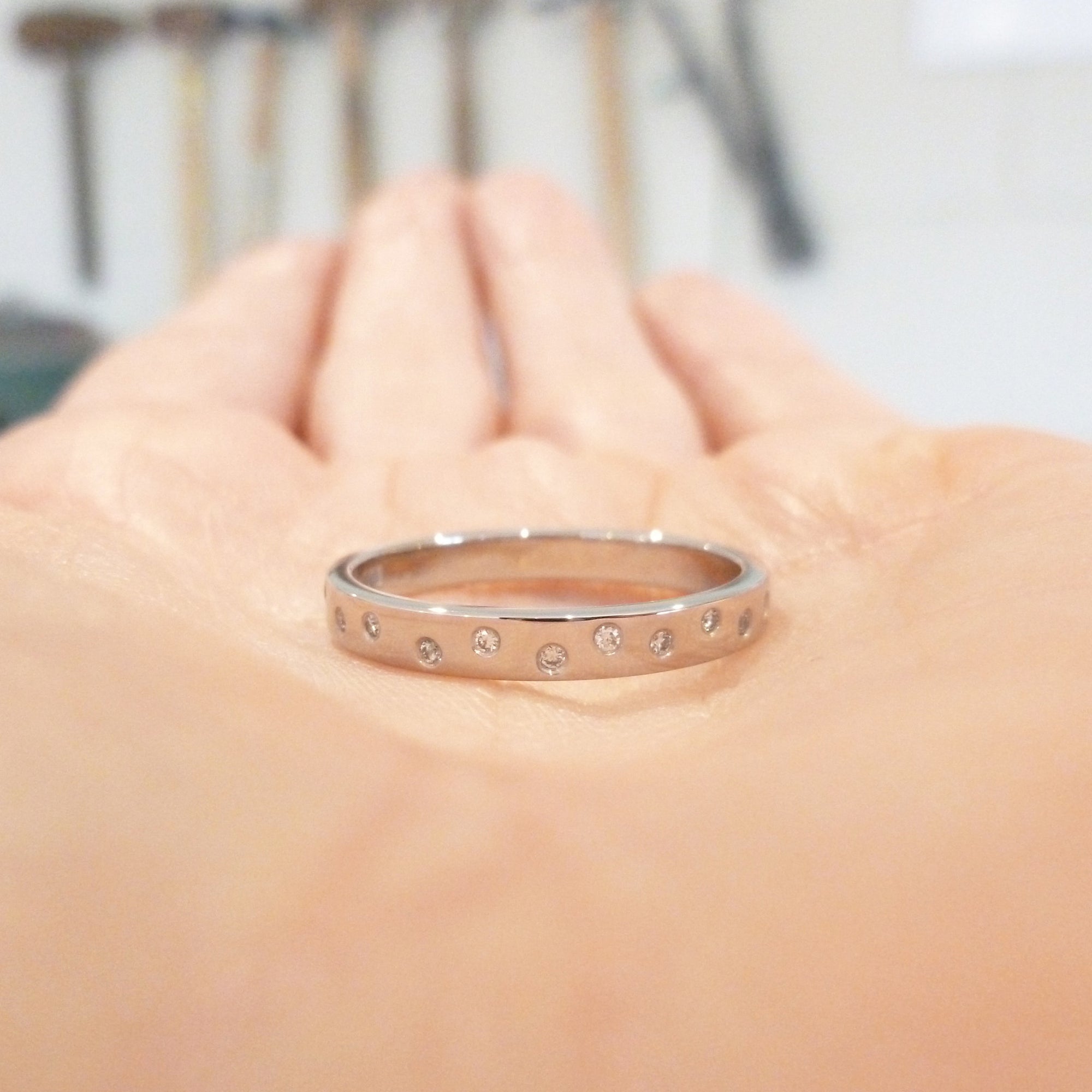 Contemporary platinum eternity ring. Bespoke jewellery by Sue Lane.