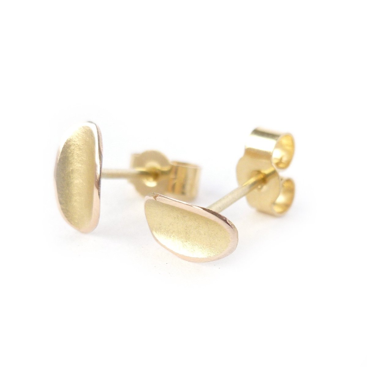 simple, small, discreet modern gold stud earrings with a unique touch. Handmade by Sue Lane Contemporary Jewellery