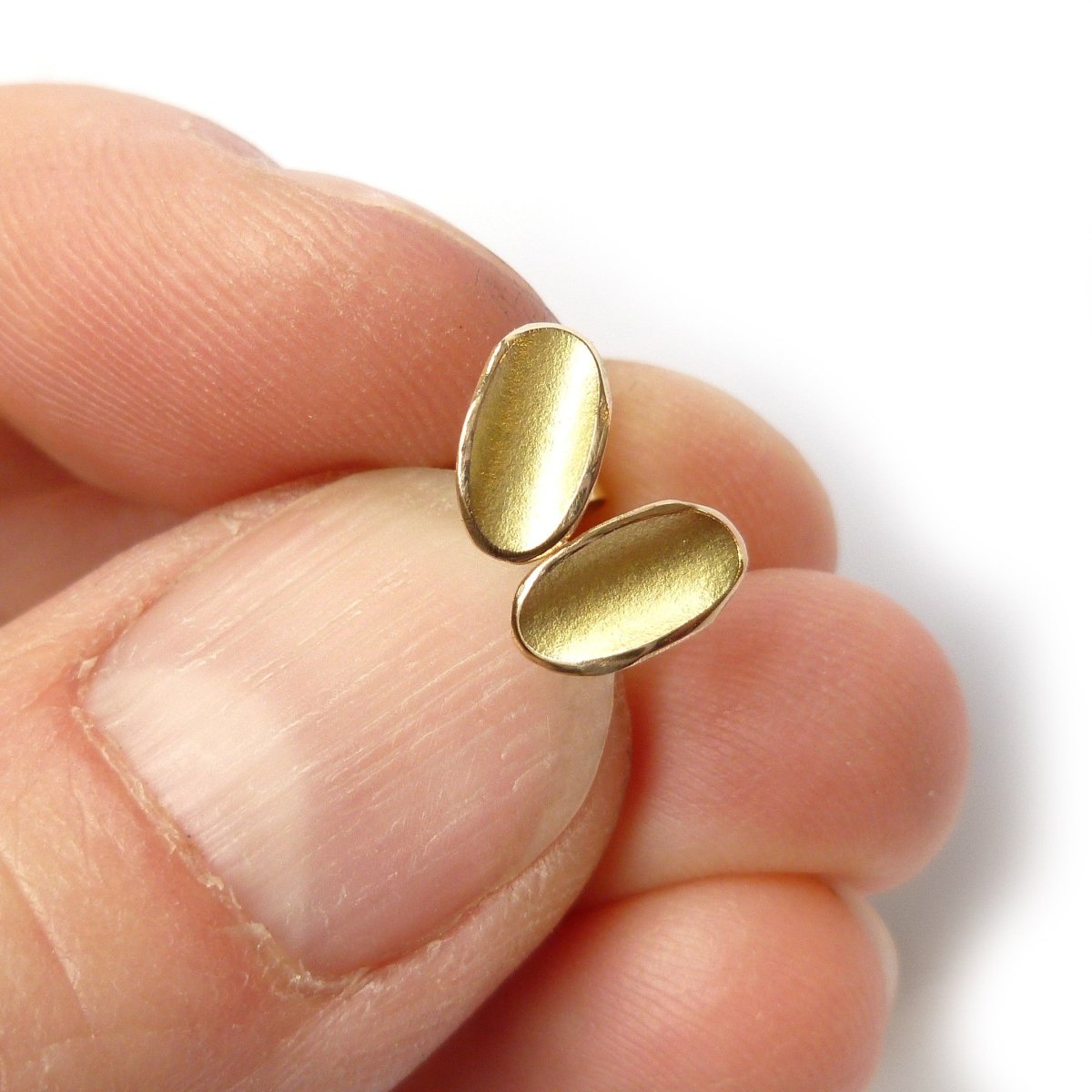 simple, small, discreet modern gold stud earrings with a unique touch. Handmade by Sue Lane Contemporary Jewellery