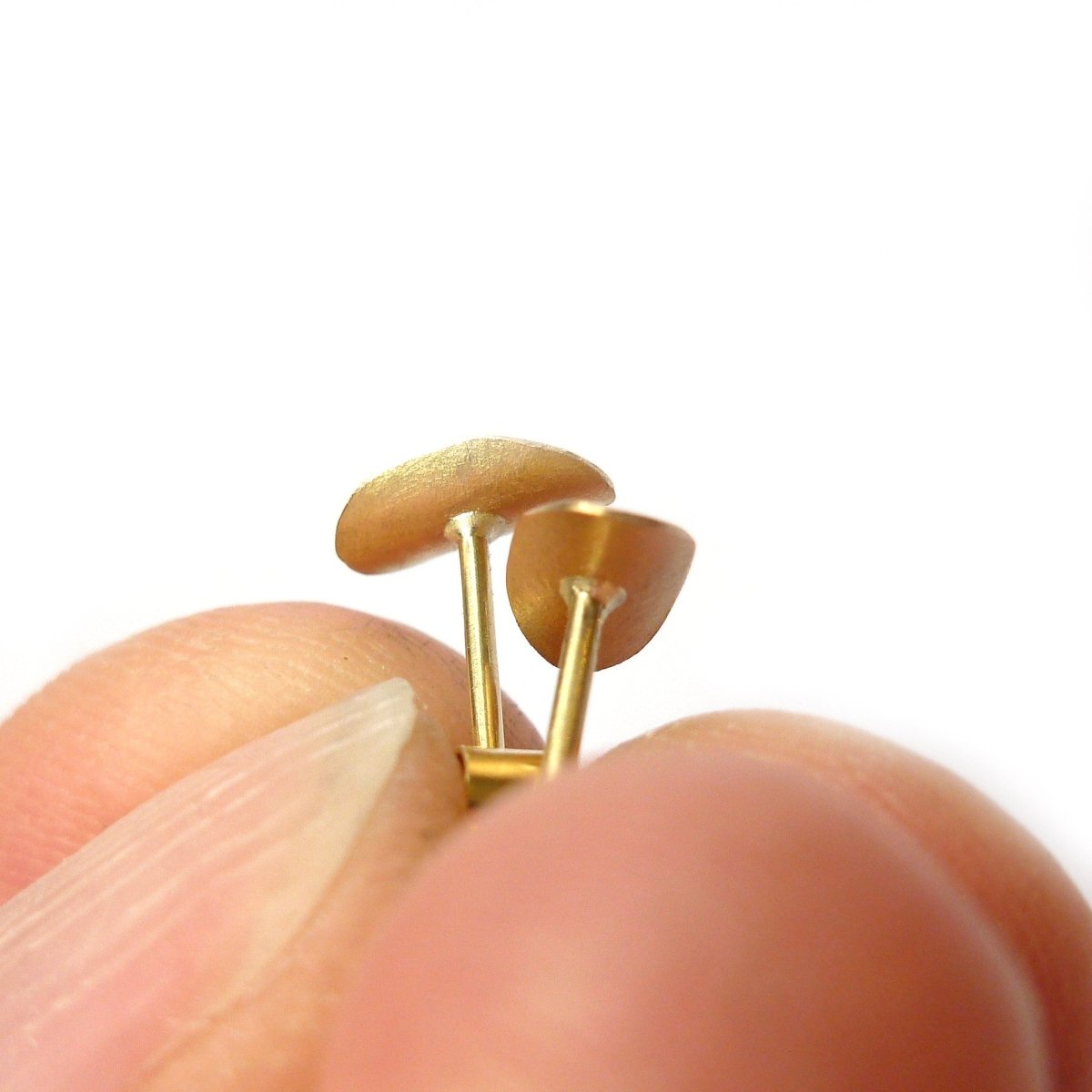 simple, small, discreet modern gold stud earrings with a unique touch. Handmade by Sue Lane Contemporary Jewellery