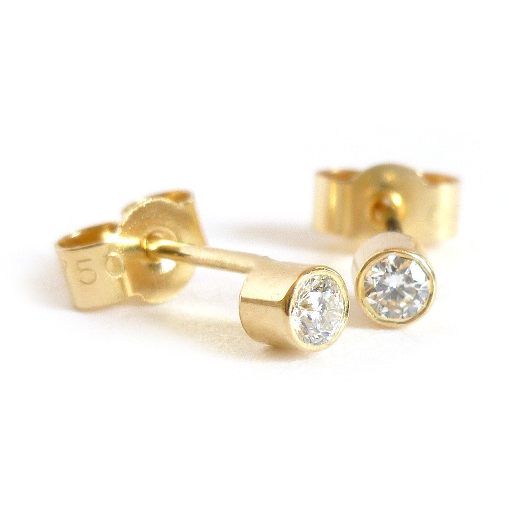 Modern, unique, bespoke, contemporary gold earrings by Sue Lane