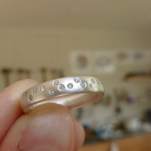 Unusual, unique, bespoke and modern silver and 12 diamond dress ring, wedding ring, eternity ring, engagement brushed finish. Handmade by Sue Lane Jewellery UK