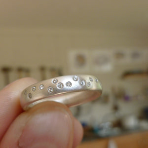 Unusual, unique, bespoke and modern silver and 12 diamond dress ring, wedding ring, eternity ring, engagement brushed finish. Handmade by Sue Lane Jewellery UK