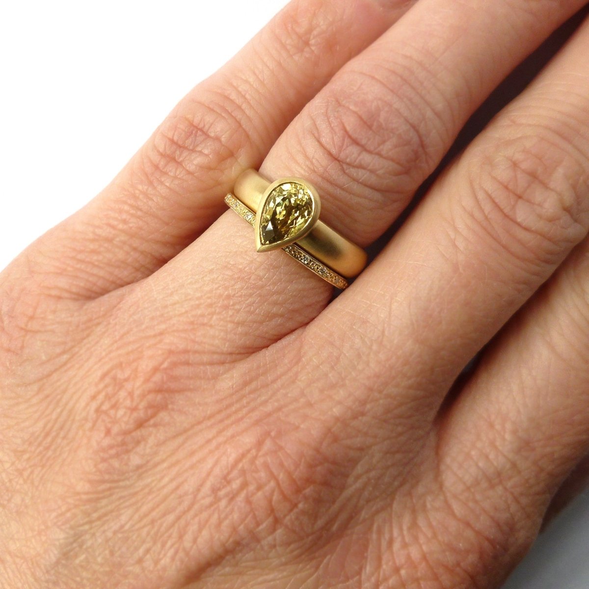 18ct gold and pave set diamond classic eternity ring