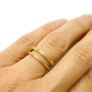 modern gold and pave diamond eternity ring made by designer maker sue lane UK