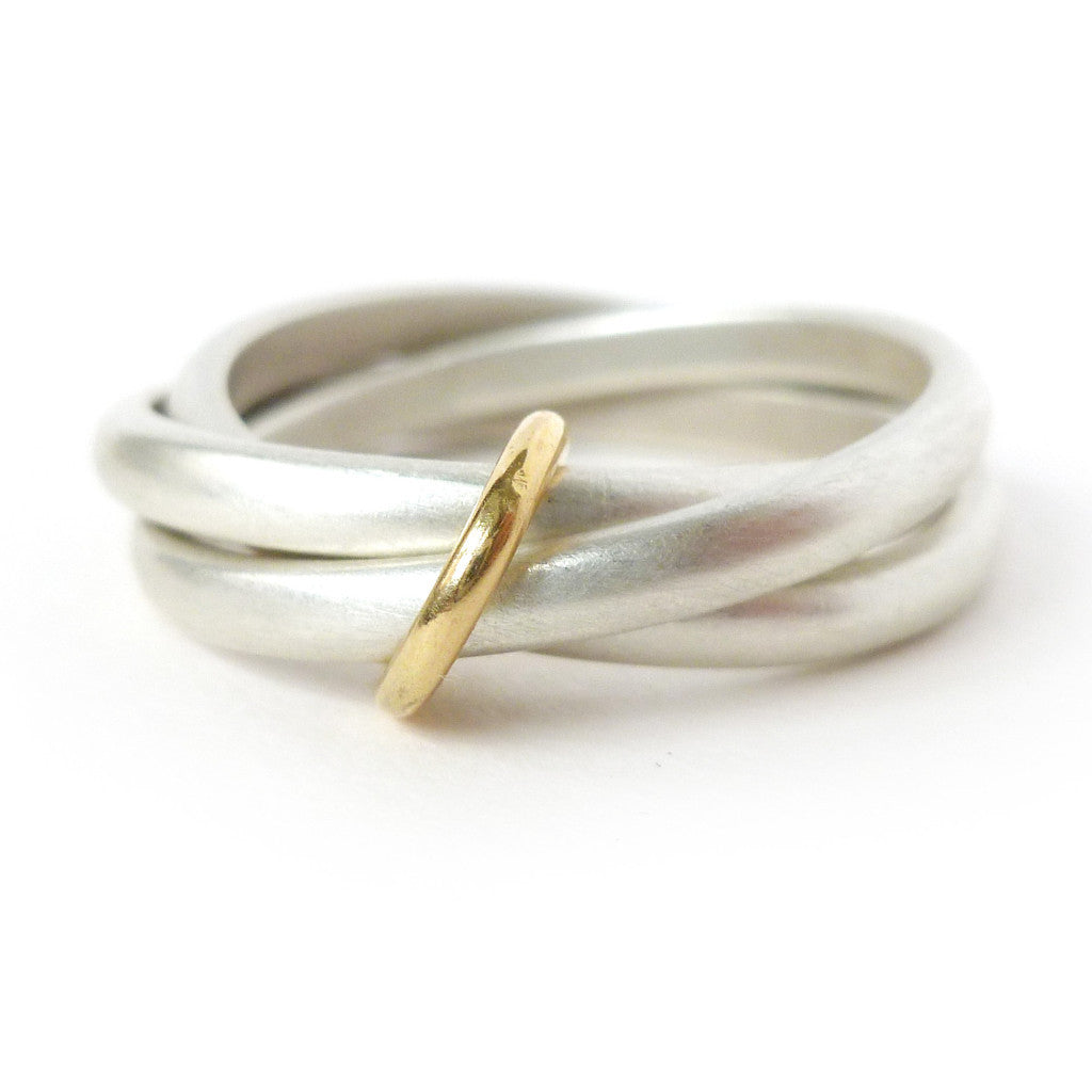 Unusual, unique, bespoke and modern silver "Russian Wedding ring" playful and tactile with brushed finish. Handmade by Sue Lane Contemporary Jewellery UK. 