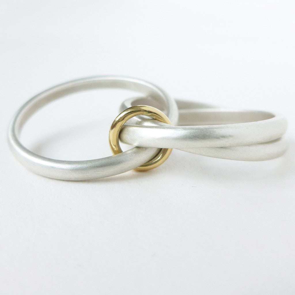 Unusual, unique, bespoke and modern silver "Russian Wedding ring" playful and tactile with brushed finish. Handmade by Sue Lane Contemporary Jewellery UK. 