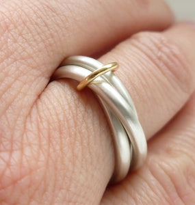 Unusual, unique, bespoke and modern silver "Russian Wedding ring" playful and tactile with brushed finish. Handmade by Sue Lane Contemporary Jewellery UK. 