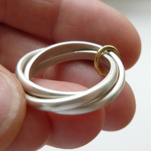 Unusual, unique, bespoke and modern silver "Russian Wedding ring" playful and tactile with brushed finish. Handmade by Sue Lane Contemporary Jewellery UK. 