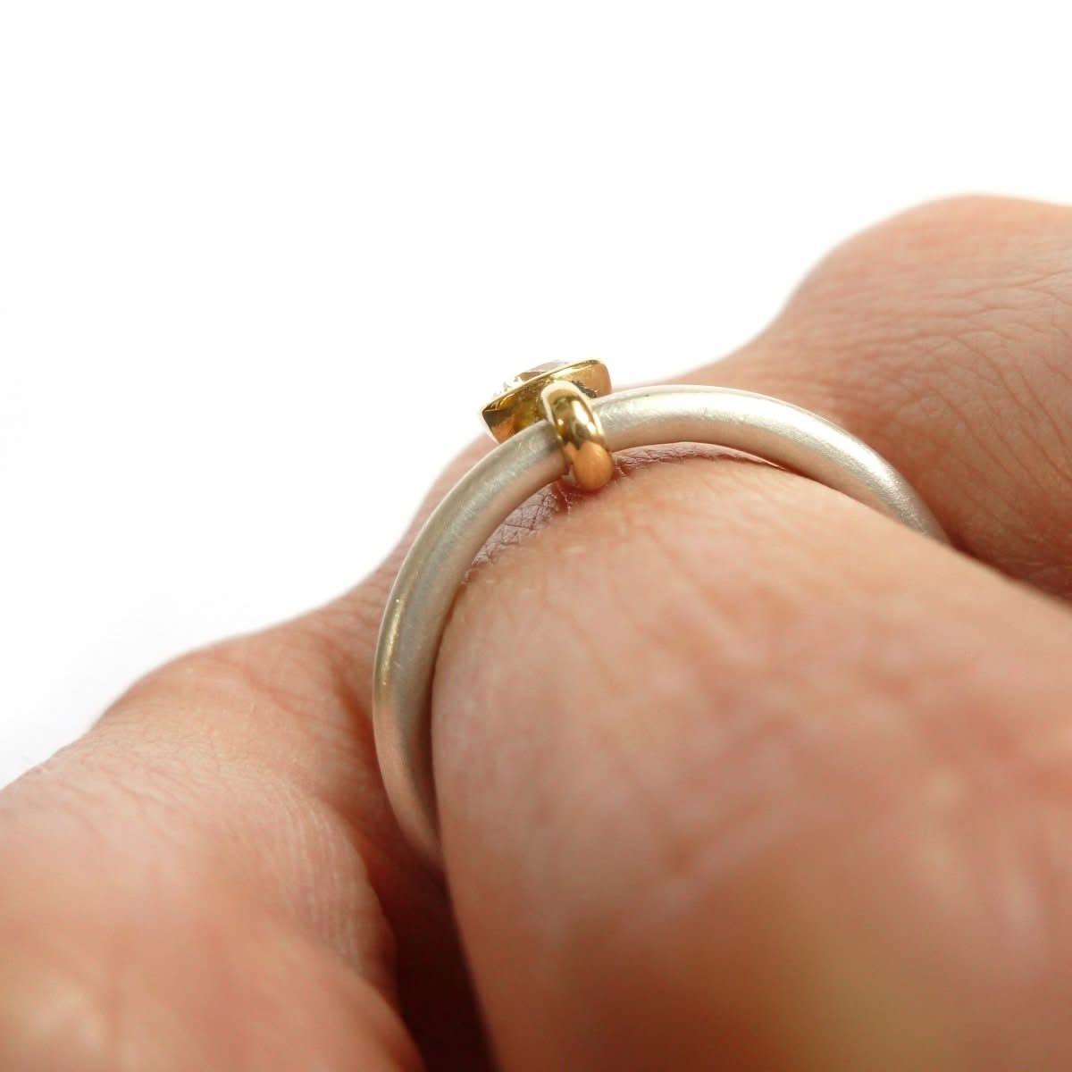 Silver and 18ct gold ring with 0.25pt diamond
