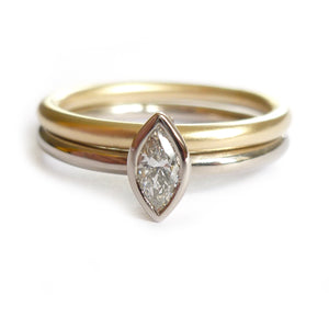 Two linking rings joined together making a special engagement ring. Multi band ring or interlocking ring, sometimes called double band ring too. Contemporary.