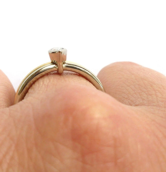 Two linking rings joined together making a special engagement ring. Multi band ring or interlocking ring, sometimes called double band ring too. Contemporary and bespoke. 