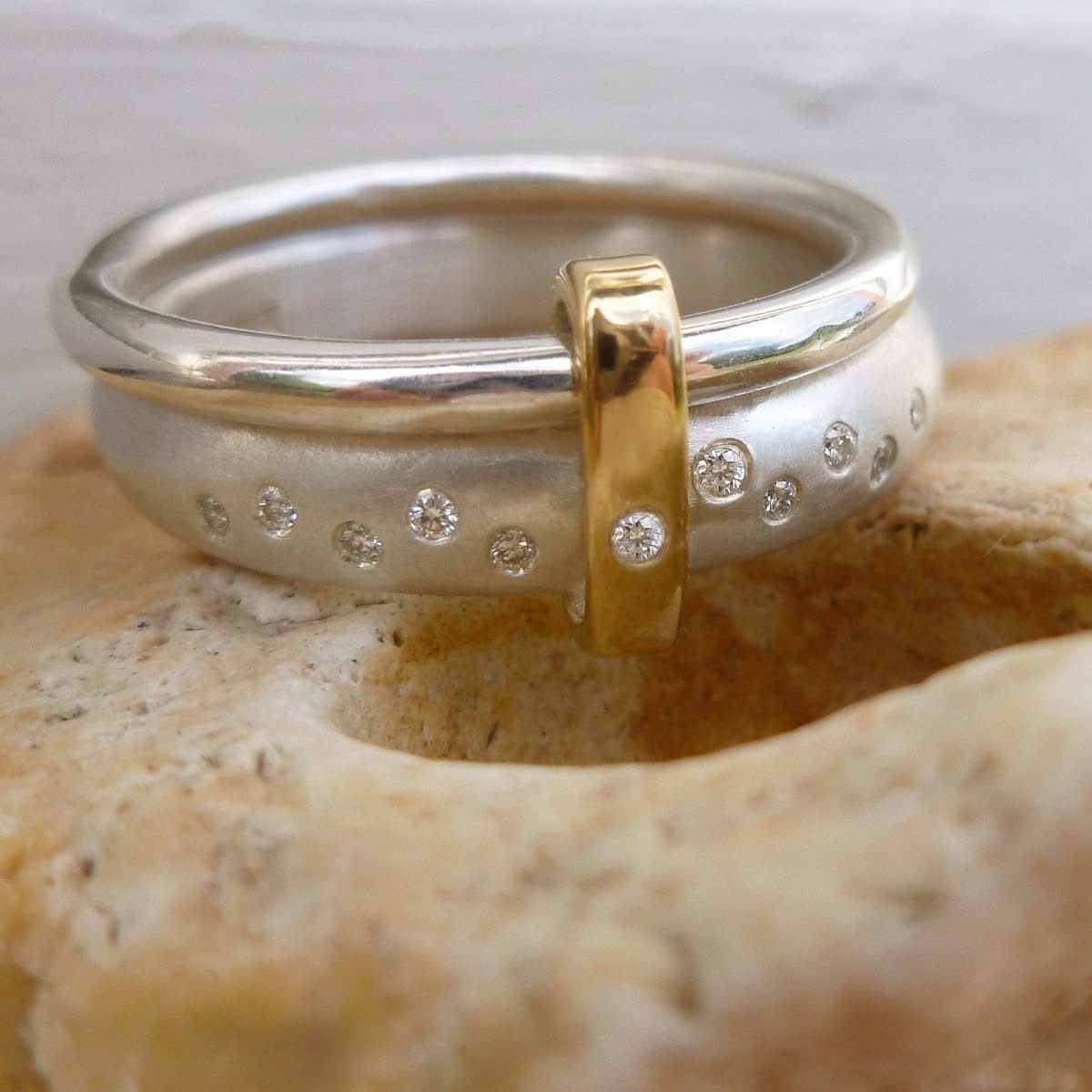 Modern unique and bespoke contemporary silver gold and diamond eternity style two band stacking ring by Sue Lane