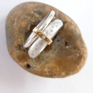 Modern unique and bespoke contemporary silver gold and diamond eternity style two band stacking ring by Sue Lane