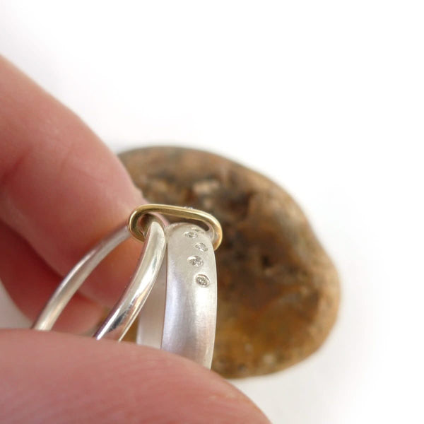 Modern unique and bespoke contemporary silver gold and diamond eternity style two band stacking ring by Sue Lane