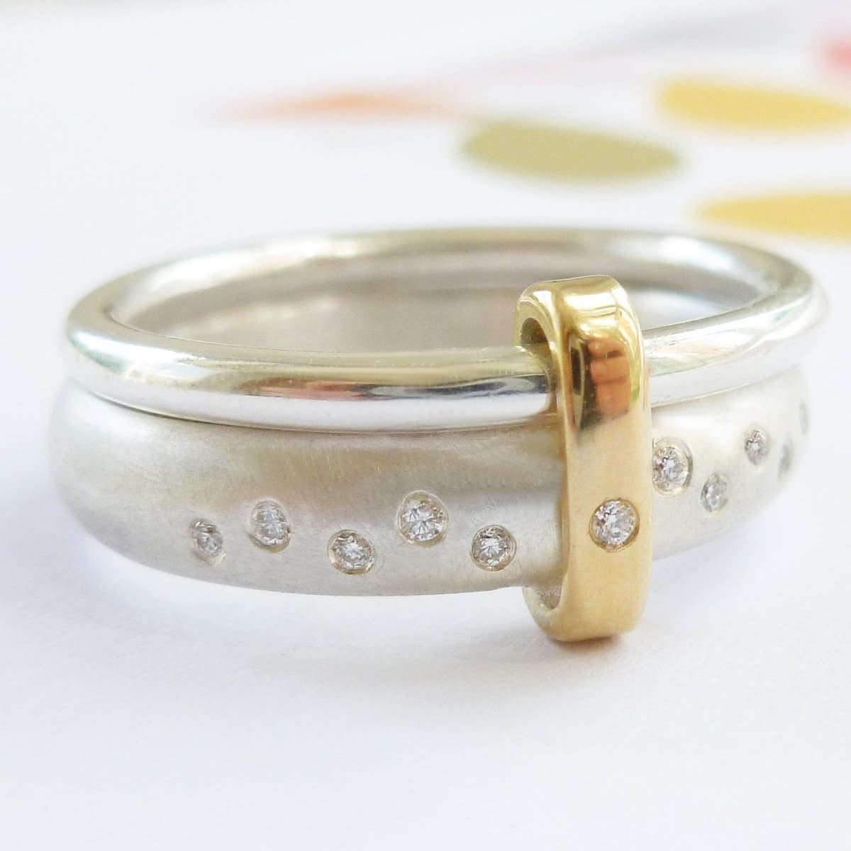 Modern unique and bespoke contemporary silver gold and diamond eternity style two band stacking ring by Sue Lane