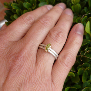 Modern silver and peridot ring