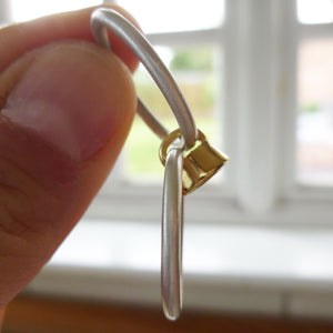 modern silver and peridot ring