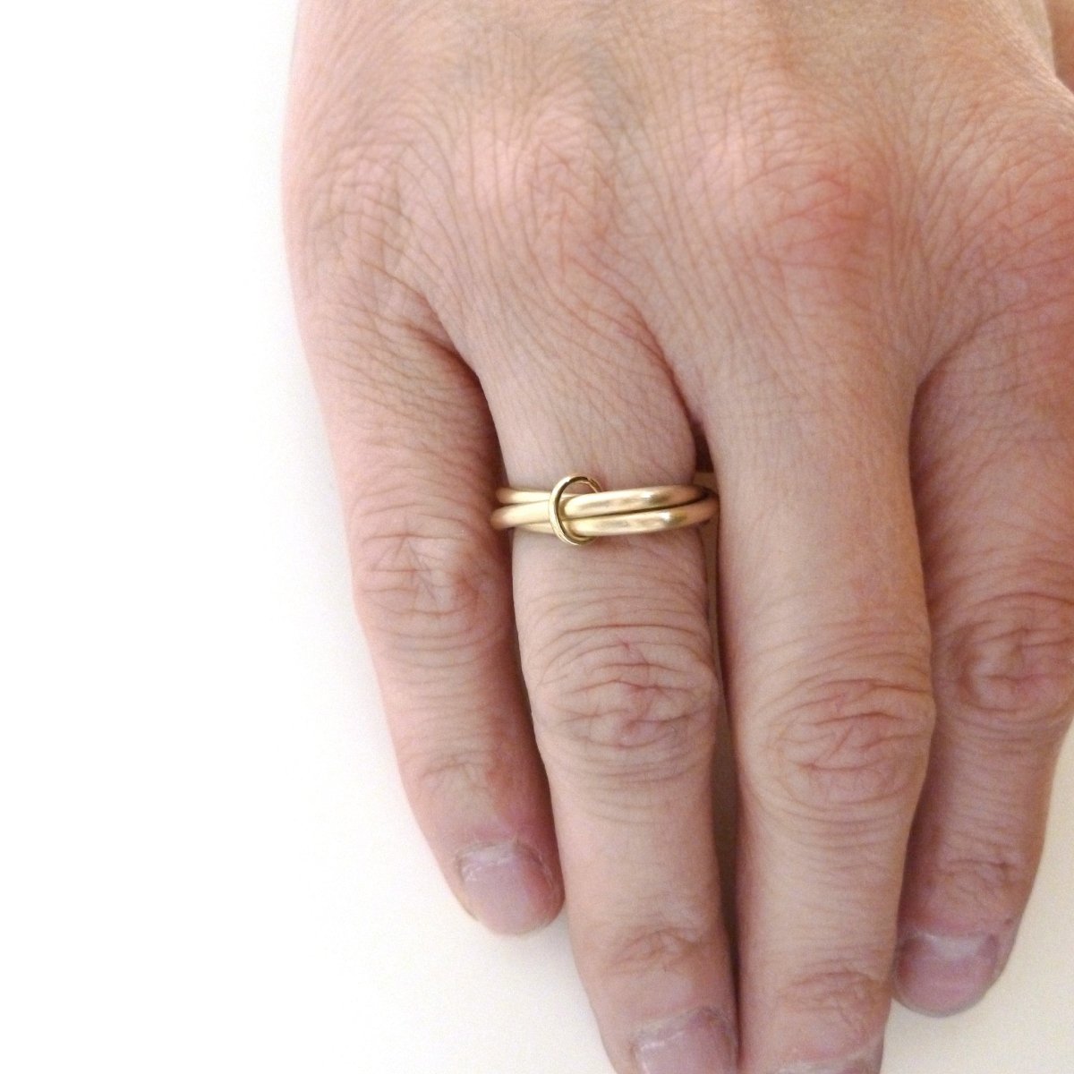 linked gold wedding ring, handmade in UK by designer and maker Sue Lane