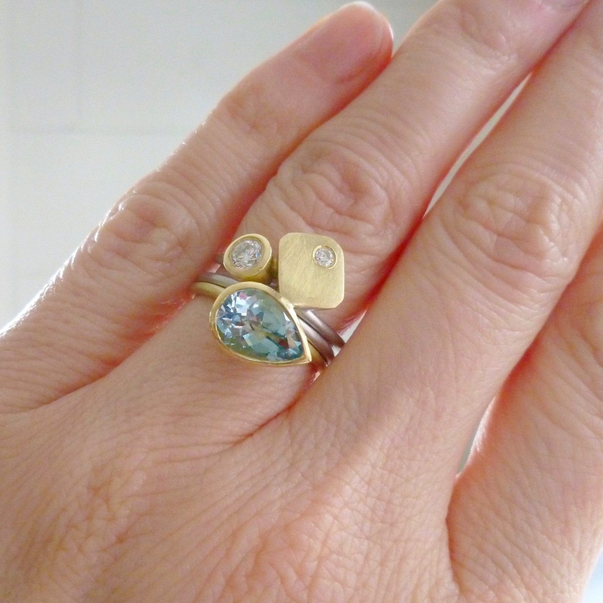 modern chunky two tone aquamarine and diamond ringset un design and maker Sue Lane