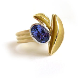 contemporary gold platinum and tanzanite ring with gold leaf shape detail by designer and maker Sue Lane