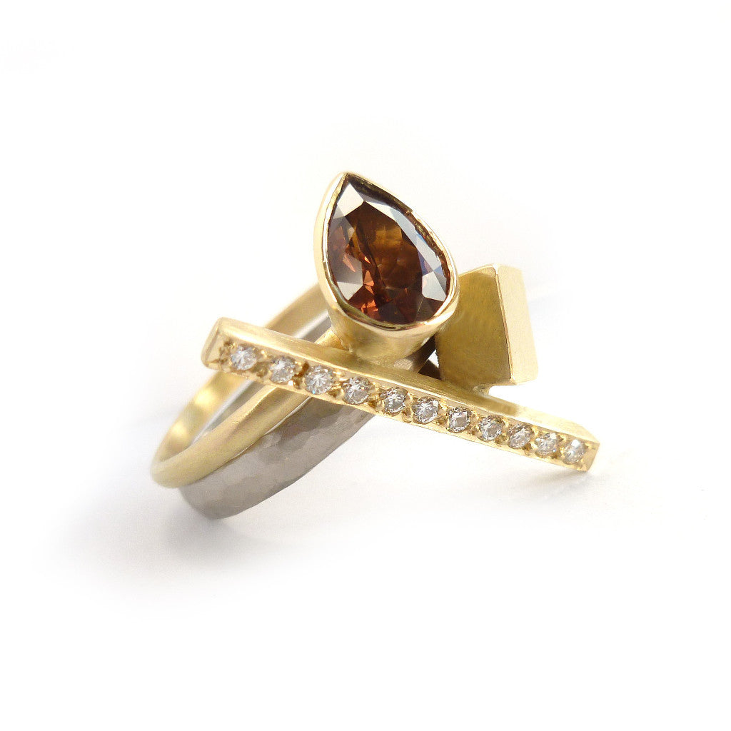 Bespoke and unique 18ct white and yellow gold, garnet and diamond ring