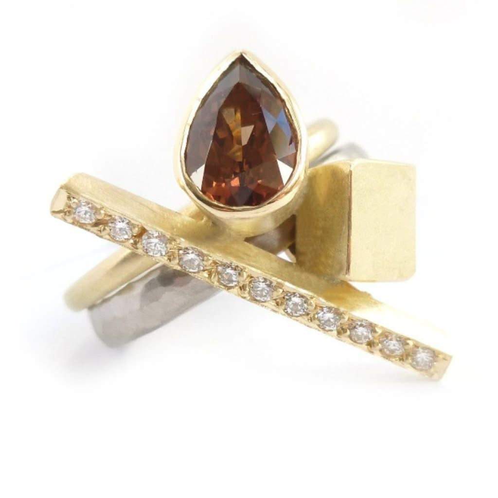 Bespoke and unique 18ct white and yellow gold, garnet and diamond ring