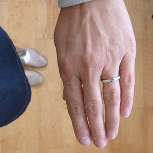 modern silver and aquamarine stacking ring with brushed finish