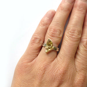 bespoke platinum and gold ring with natural green pear shape diamond with GIA certification