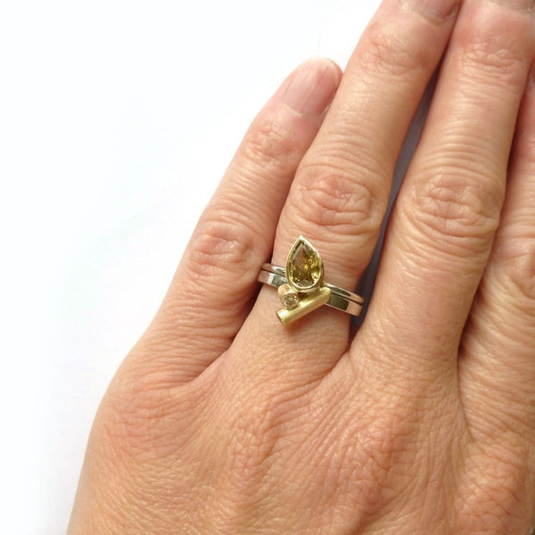 bespoke platinum and gold ring with natural green pear shape diamond with GIA certification