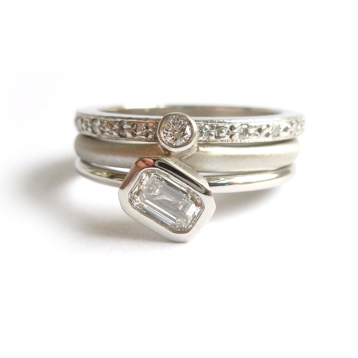 Bespoke platinum and emerald cut two band stacking diamond engagement  ring