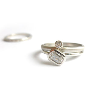 Bespoke platinum and emerald cut two band diamond ring, perfect to stack with your own rings