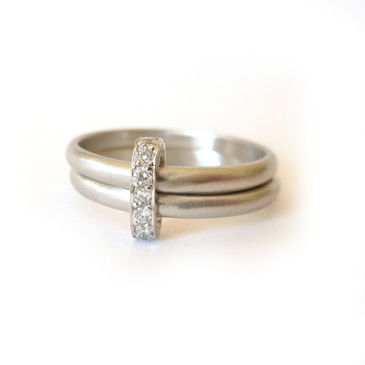 Multi band ring or interlocking ring, sometimes called double band ring too.