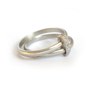 bespoke modern platinum and diamond two band wedding ring handmade by Sue Lane. Multi band ring or interlocking ring, sometimes called double band ring too.