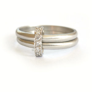 bespoke modern platinum and diamond eternity ring. Multi band ring or interlocking ring, sometimes called double band ring too.