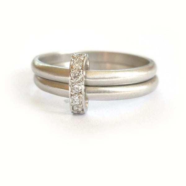 bespoke modern platinum and diamond eternity ring. Multi band ring or interlocking ring, sometimes called double band ring too.