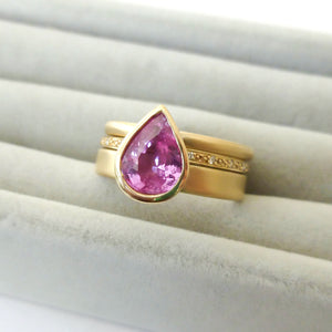 Pink pear shape sapphire and diamond stacking interlocking treble band 18ct yellow gold contemporary ringset ring
