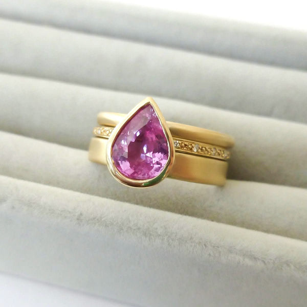 Pink pear shape sapphire and diamond stacking interlocking treble band 18ct yellow gold contemporary ringset ring