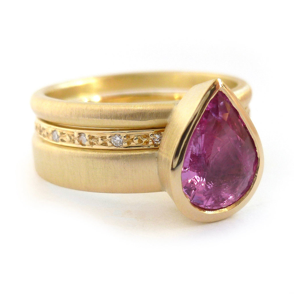 Pink pear shape sapphire and diamond stacking interlocking treble band 18ct yellow gold contemporary ringset ring