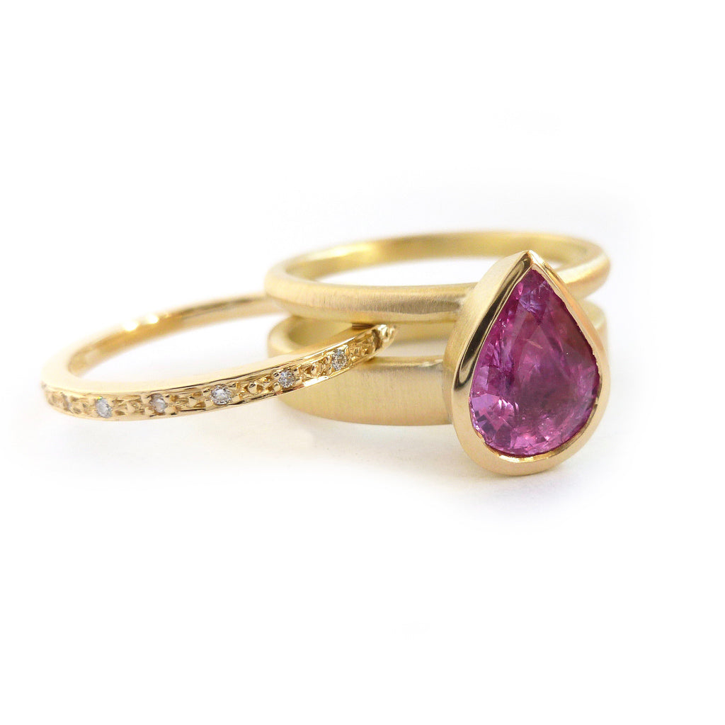 Pink pear shape sapphire and diamond stacking interlocking treble band 18ct yellow gold contemporary ringset ring