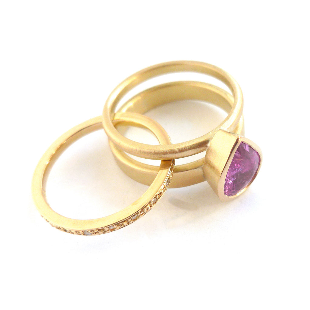 Pink pear shape sapphire and diamond stacking interlocking treble band 18ct yellow gold contemporary ringset ring