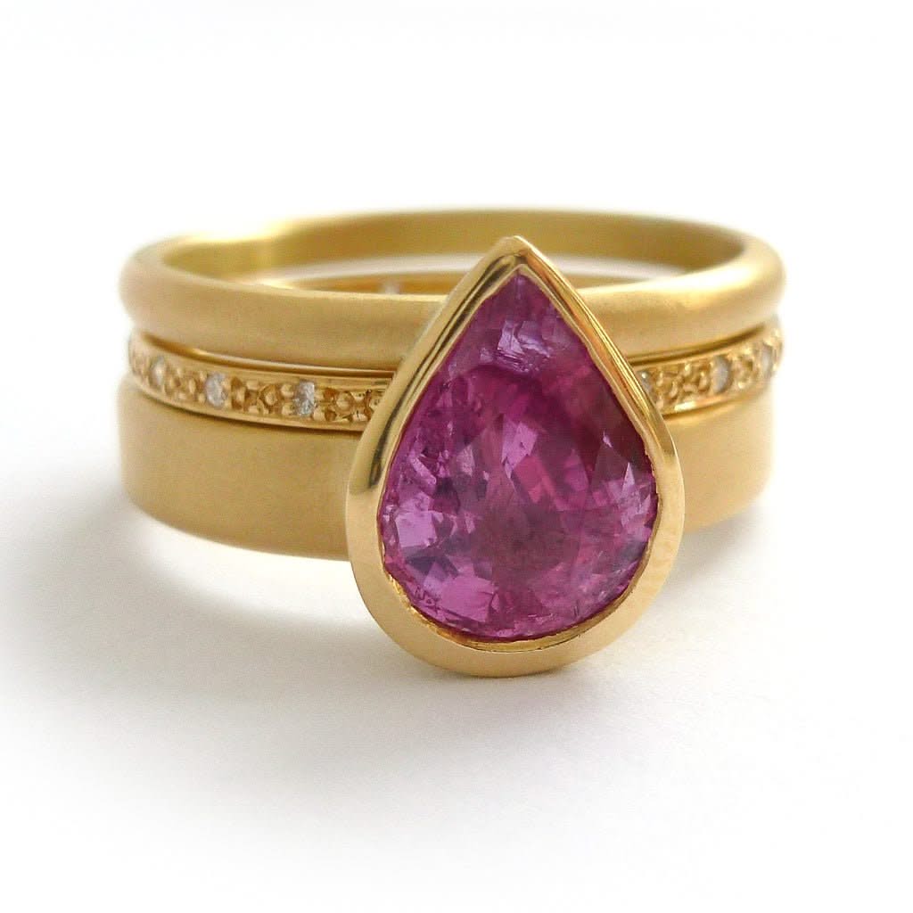 Pink pear shape sapphire and diamond stacking interlocking treble band 18ct yellow gold contemporary ringset ring