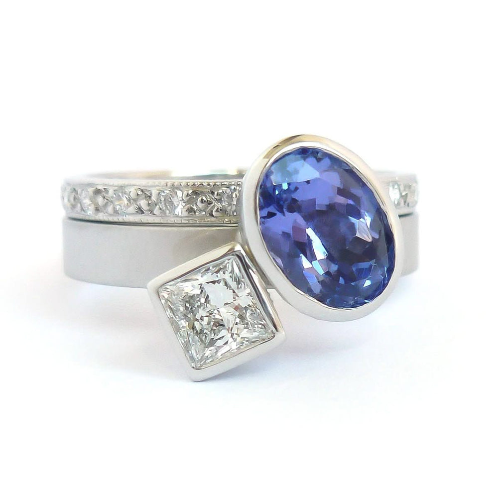 Platinum and tanzanite two band stacking ring set - contemporary, modern, bespoke and unique - interlocking.