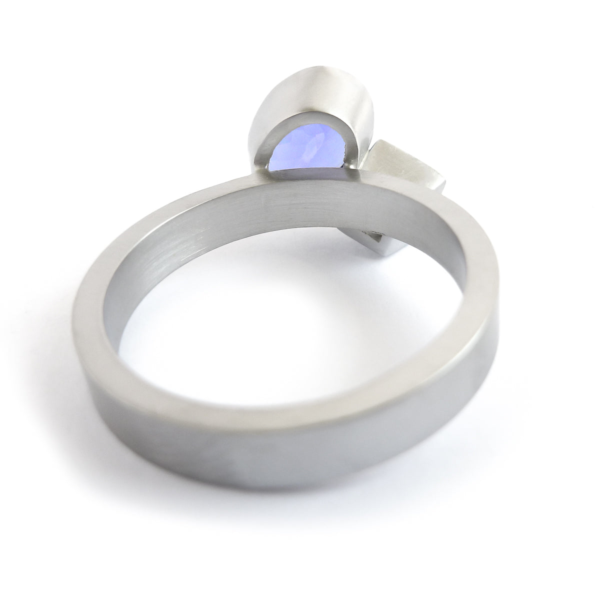 Platinum and tanzanite two band stacking ring set - contemporary, modern, bespoke and unique - interlocking.
